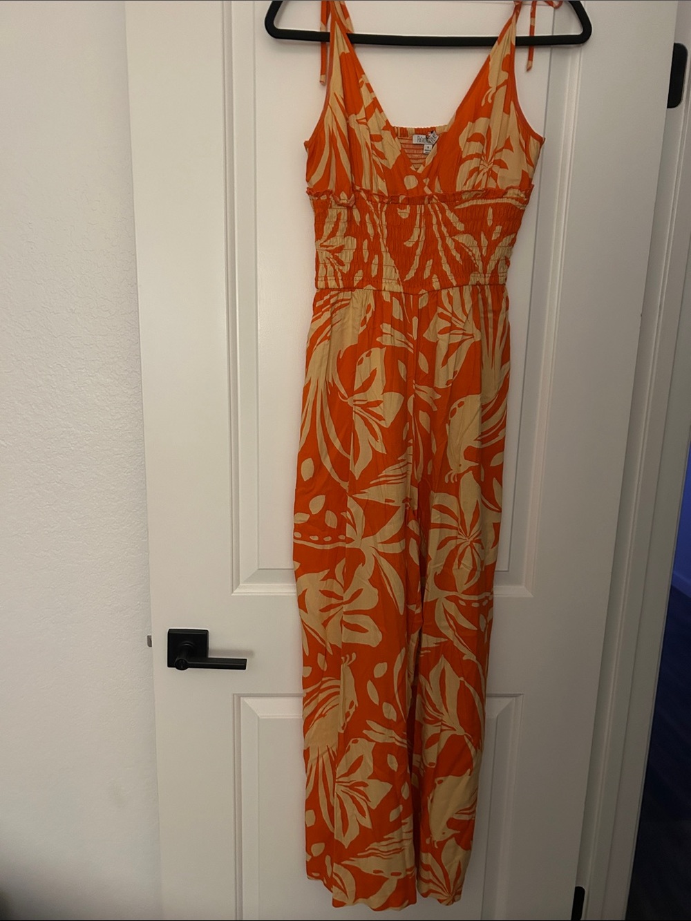 Woman’s Orange Floral One-Piece Jumpsuit
